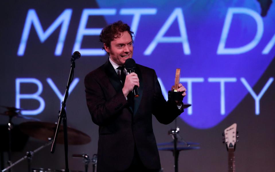 Matty Day accepts the award for Original Album of the Year at the Bammys, the first Green Bay Area Music Awards, on Thursday night at The Tarlton Theatre.