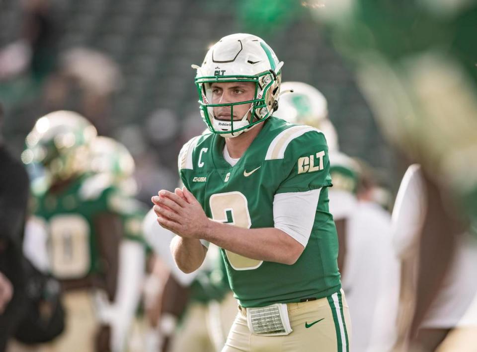 Former Charlotte quarterback Chris Reynolds (pictured) is gone, but new coach Biff Poggi said he has three quarterbacks he likes and that he plans to play them all.