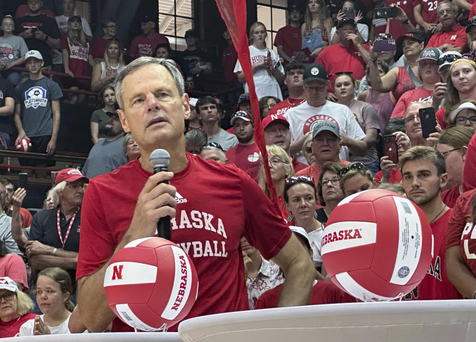 Nebraska NCAA college volleyball head coach John Cook speaks during a pep rally at Nebraska Coliseum in Lincoln, Neb., Wednesday, Aug. 30, 2023. An attendance record of global proportions could be set Wednesday night when the University of Nebraska hosts a celebration of volleyball at Memorial Stadium. (AP Photo/Eric Olson)