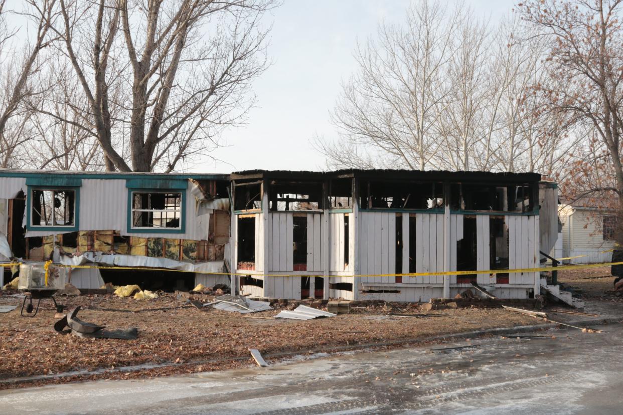 The outer walls are all that remain on this mobile home on First Curve at Lakeside Estates Thursday morning after.