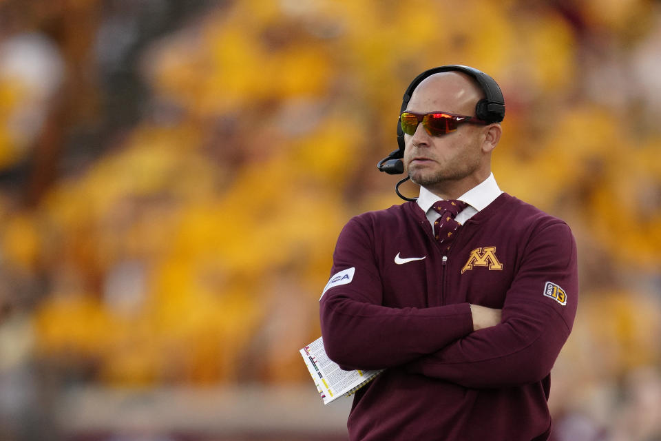 Minnesota coach P. J. Fleck watches from the sideline during the first half of the team's NCAA college football game against Nebraska, Thursday, Aug. 31, 2023, in Minneapolis. (AP Photo/Abbie Parr)