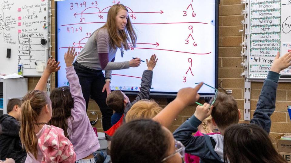 Sam Fields, a teacher at Centennial Elementary in Nampa, involves her 2nd grade math class with problem solving.