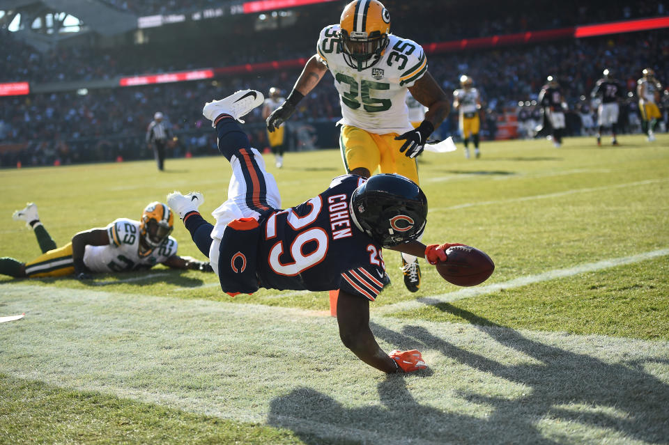 <p>Tarik Cohen #29 of the Chicago Bears scores a touchdown in the second quarter against the Green Bay Packers at Soldier Field on December 16, 2018 in Chicago, Illinois. (Photo by Stacy Revere/Getty Images) </p>