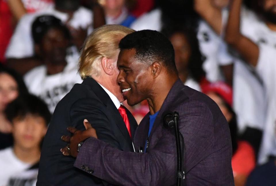 <div class="inline-image__caption"><p>Herschel Walker and former president Donald J Trump hold a Save America rally in Perry, GA, United States on September 25, 2021 </p></div> <div class="inline-image__credit">Peter Zay/Anadolu Agency via Getty</div>