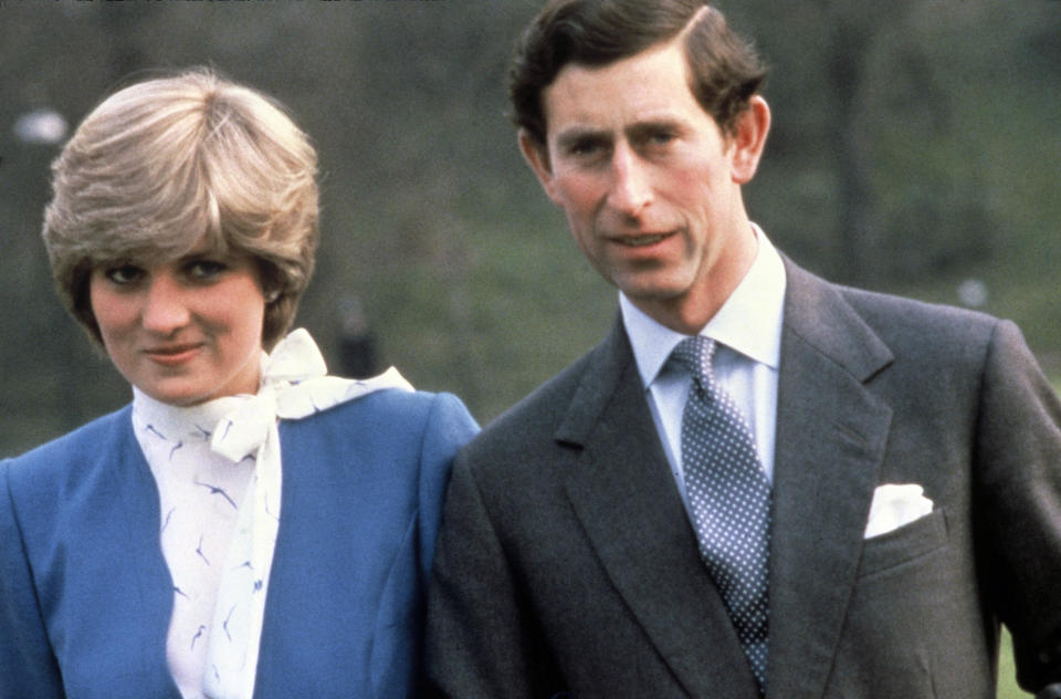 LONDON, ENGLAND - FEBRUARY 24: Lady Diana Spencer and Prince Charles, Prince of Wales pose for photographs following the announcement of their engagement in the grounds of Buckingham Palace on February 24, 1981 in London, United Kingdom. (Photo by Anwar Hussein/Getty Images)