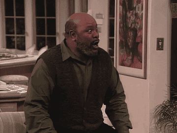 Uncle Phil laughs by throwing his head back