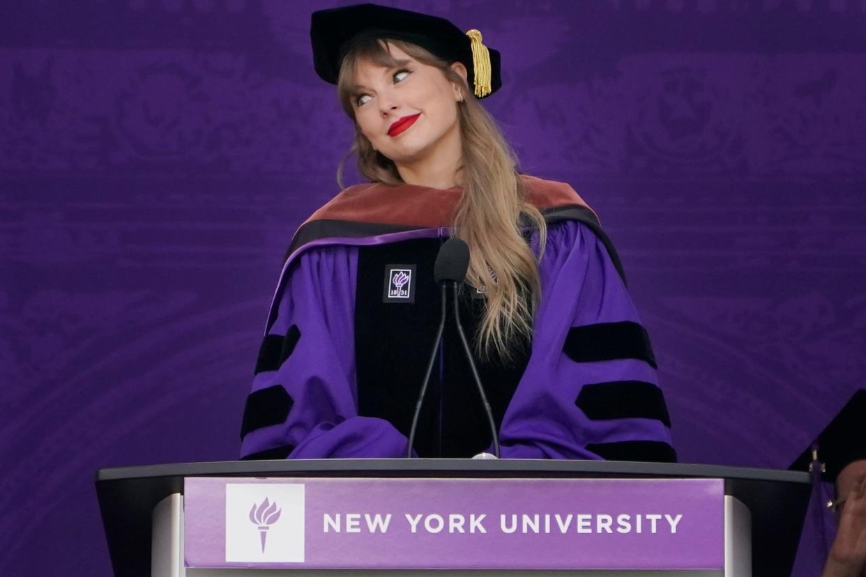 Taylor Swift speaks during a graduation ceremony for New York University at Yankee Stadium in New York.