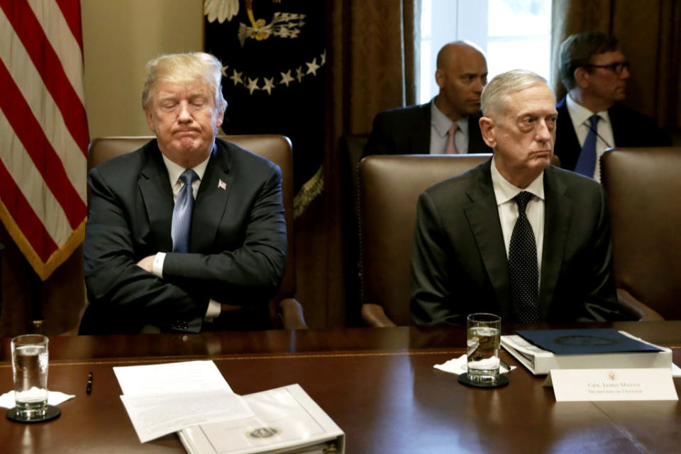 Trump, left, pauses while speaking as James Mattis, US secretary of defense, listens during a Cabinet meeting at the White House in Washington. Source: Getty