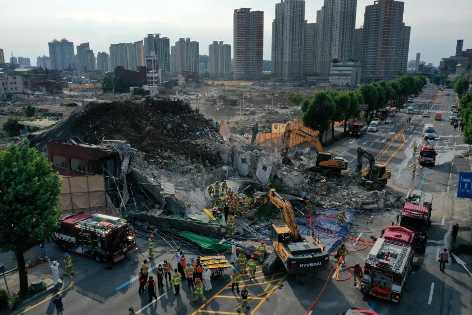 The building fell onto a busy road in the city, South Korea. Source: Reuters