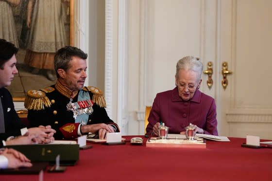 Queen Margrethe II of Denmark signs a declaration of abdication as Crown Prince Frederik becomes King Frederik X of Denmark in Copenhagen on Jan. 14, 2024.<span class="copyright">Mads Claus Rasmussen/Ritzau Scanpix—Getty Images</span>