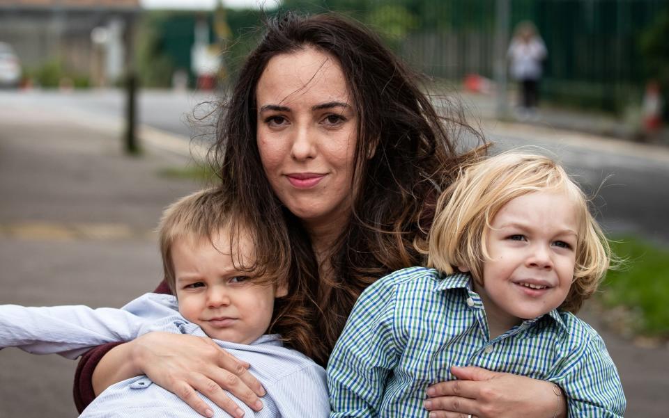 Stella Moris and sons, Gabriel (right) and Max (left) leave Belmarsh Prison after visiting her partner and their father, Julian Assange, in August  - PA