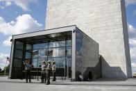 National Parks Service park rangers gather outside a new security screening building at the foot of the Washington Monument during a preview tour ahead of the monument's official reopening, Wednesday, Sept. 18, 2019, in Washington. The monument, which has been closed to the public since August 2016, is scheduled to re-open Thursday, Sept. 19. (AP Photo/Patrick Semansky)