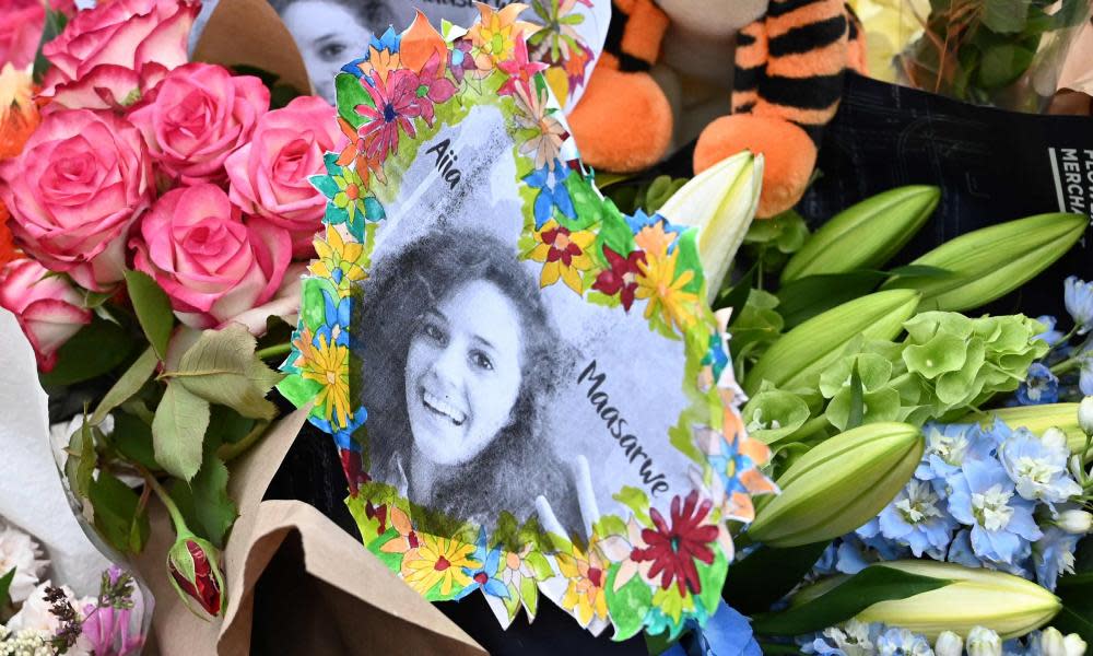 flowers during a vigil in memory of murdered Israeli student Aiia Maasarwe in Melbourne