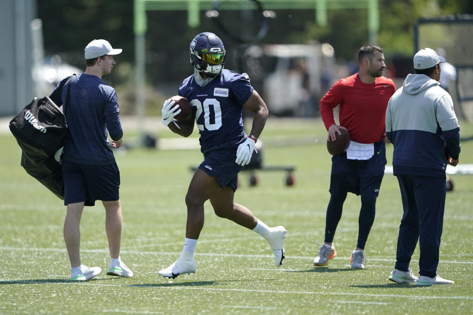 Seattle Seahawks running back Rashaad Penny (20) works out during NFL football practice, Tuesday, May 31, 2022, in Renton, Wash. (AP Photo/Ted S. Warren)