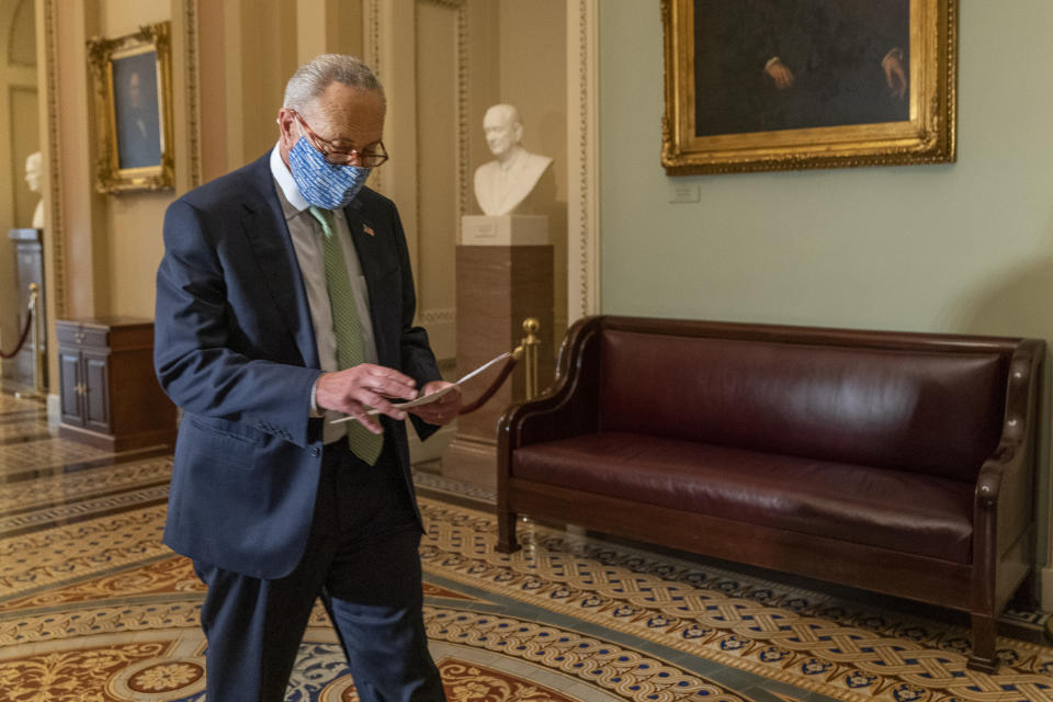 Senate Minority Leader Chuck Schumer of N.Y. walks outside the Senate floor on Capitol Hill, Thursday, Oct. 1, 2020, in Washington. (AP Photo/Manuel Balce Ceneta)