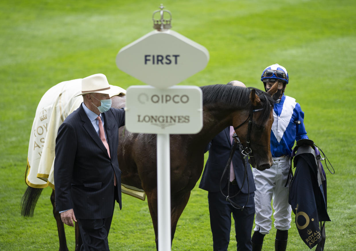 Trainer John Gosden and jockey James Doyle in the winners enclosure after Lord North's victory in the Prince Of Wales's Stakes at Royal Ascot