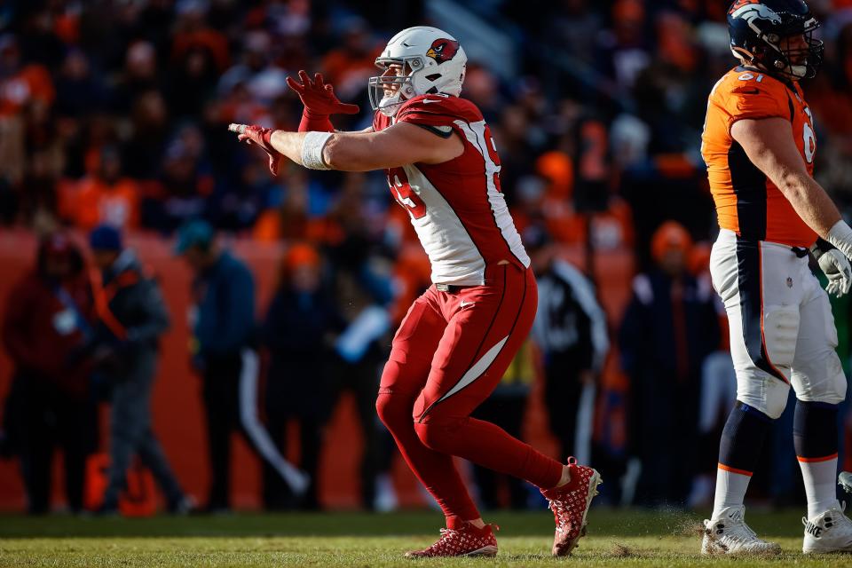 Dec 18, 2022; Denver, Colorado, USA; Arizona Cardinals defensive end J.J. Watt (99) celebrates after a sack in the second quarter against the Denver Broncos at Empower Field at Mile High.