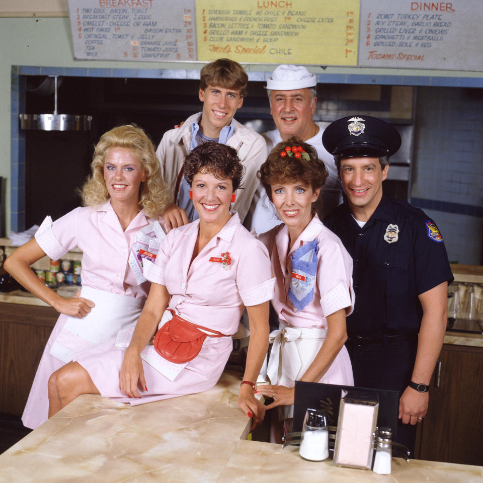 LOS ANGELES - JUNE 1: Alice, a television situation comedy, originally broadcast on CBS. Featuring (in front, left to right) Celia Weston (as waitress Jolene Hunnicutt), Linda Lavin (as waitress Alice Hyatt), Beth Howland (as waitress Vera Louise Gorman) and Charles Levin (as police officer Elliot Novak). In back, left to right, Philip McKeon (as Tommy Hyatt) and Vic Tayback (as Mel Sharples, diner owner and cook). Image dated June 1, 1984. (Photo by CBS via Getty Images) 