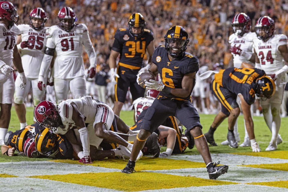 Tennessee running back Dylan Sampson (6) celebrates a touchdown against South Carolina during the second half of an NCAA college football game Saturday, Sept. 30, 2023, in Knoxville, Tenn. (AP Photo/Wade Payne)