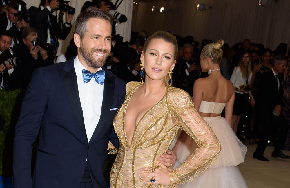 Blake Lively and Ryan Reynolds are said to have skipped the Met Gala to stay at home with their children credit:Bang Showbiz