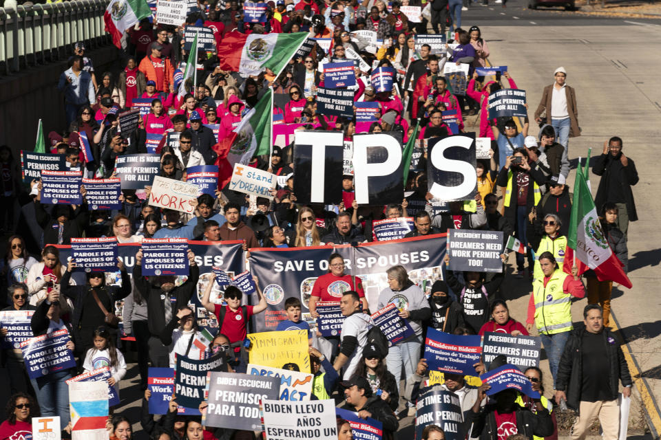 Immigrants who have been in the U.S. for years, rally asking for work permits for Deferred Action for Childhood Arrivals (DACA), and Temporary Protected Status (TPS), programs at Franklin Park in Washington, Tuesday, Nov. 14, 2023. (AP Photo/Jose Luis Magana)