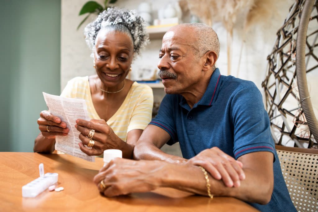 A couple go over their weekly prescriptions. 