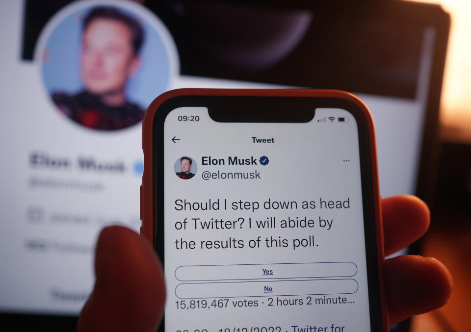 A phone being held showing the twitter poll on screen, in a home in London. Elon Musk looks set to step down from the top job at Twitter after just two months, if he respects the results of an online poll launched on Sunday night. Around 57% of 14 million voters had said that Mr Musk should resign as Twitter chief executive with around three hours to go until the poll closed. Picture date: Monday December 19, 2022. (Photo by Yui Mok/PA Images via Getty Images)