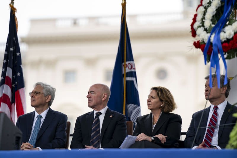 (L-R) Attorney General Merrick Garland, Secretary of Homeland Security Alejandro Mayorkas, Deputy Attorney General Lisa Monaco and FBI Director Christopher Wray look on during Wednesday's National Peace Officers' Memorial Service at the U.S. Capitol in Washington, DC.Photo by Bonnie Cash/UPI