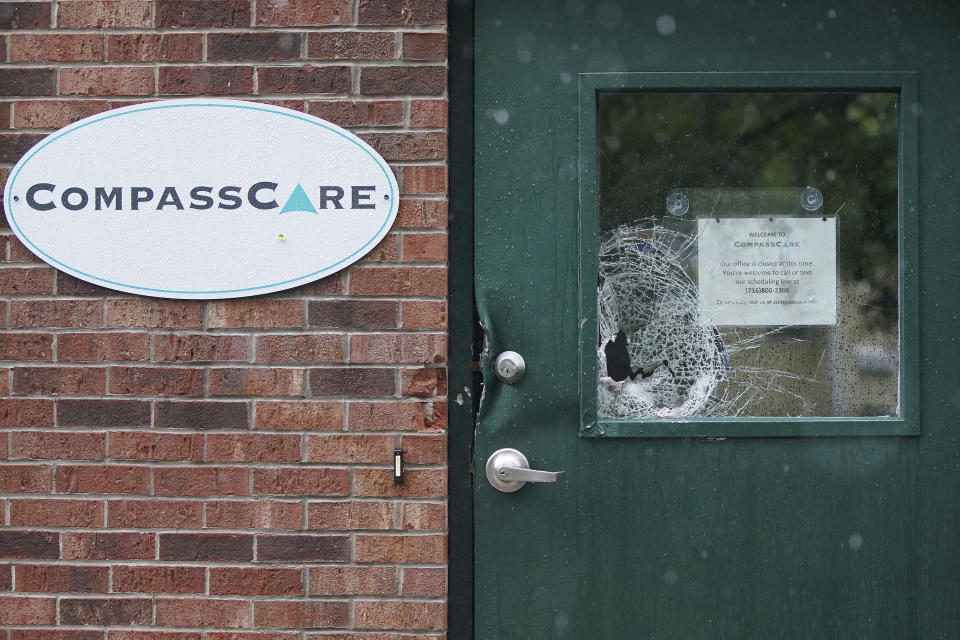 Some of the damage is shown after an early morning firebombing at the CompassCare facility, an anti-abortion center in Amherst, N.Y., on Tuesday, June 7, 2022. (Mark Mulville/The Buffalo News via AP)