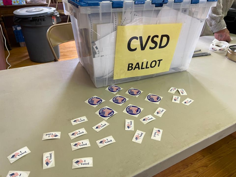 Hinesburg election officials collect Champlain Valley School District ballots separate from town ballots on Town Meeting Day, March 5, 2024. Hinesburg is in a consolidated school district which also includes the towns of Charlotte, Shelburne, St. George and Williston. School budgets' impact on property taxes are expected to be high this year.