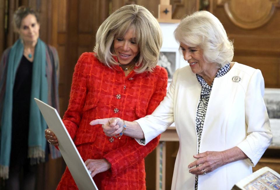 Brigitte Macron, pictured with Queen Camilla (via REUTERS)