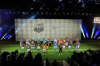 NEW YORK, NY - APRIL 03: Nike debuts new NFL uniforms on April 3, 2012 in New York City. NFL players; AFC: Baltimore Ravens, Ray Rice / Cincinnati Bengals, Andy Dalton / Cleveland Browns, Joe Haden / Pittsburgh Steelers, Ben Roethlisberger / Houston Texans, Andre Johnson / Indianapolis Colts, Robert Mathis / Jacksonville Jaguars, Rashean Mathis / Tennessee Titans, Nate Washington / Buffalo Bills, George Wilson / Miami Dolphins, Karlos Dansby / New England Patriots, Wes Welker / New York Jets, Shonn Greene / Denver Broncos, Champ Bailey / Kansas City Chiefs, Dwayne Bowe / Oakland Raiders, Darren McFadden / San Diego Chargers, Ryan Matthews. NFC: Chicago Bears, Brian Urlacher / Detroit Lions, Ndamukong Suh / Green Bay Packers, Jermichael Finley / Minnesota Vikings, Percy Harvin / Atlanta Falcons, Justin Blalock / Caroline Panthers, Deangelo Williams / New Orleans Saints, Pierre Thomas / Tampa Bay Buccaneers, LaGarrette Blount / Dallas Cowboys, Jason Witten / New York Giants, Victor Cruz / Philadelphia Eagles, Michael Vick / Washington Redskins, Brian Orakpo / Arizona Cardinals, Larry Fitzgerald / San Francisco 49ers, Alex Smith / Seattle Seahawks, Kam Chancellor / St. Louis Rams, Cortland Finnegan (Photo by Jason Kempin/Getty Images for Nike)