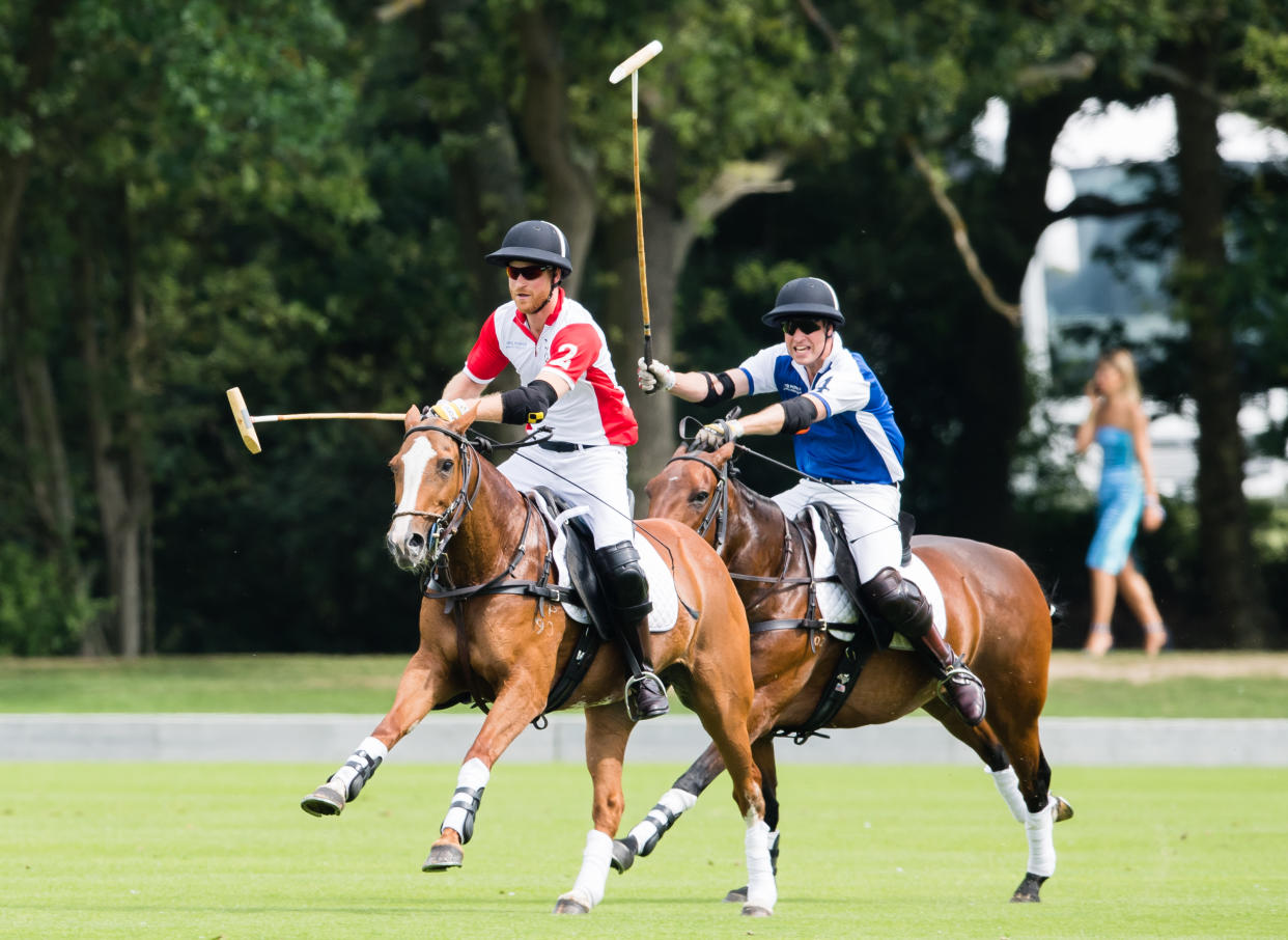 WOKINGHAM, ENGLAND - JULY 10: Prince William, Duke of Cambridge and Prince Harry, Duke of Sussex play during The King Power Royal Charity Polo Day at Billingbear Polo Club on July 10, 2019 in Wokingham, England. (Photo by Samir Hussein/WireImage)