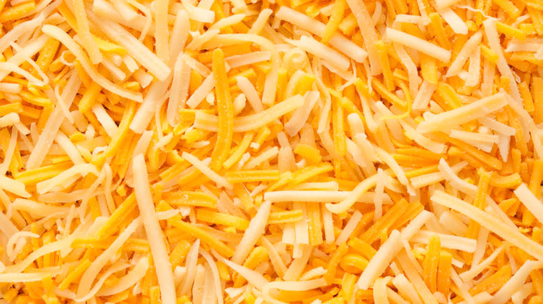 grated Parmesan and cheddar cheeses