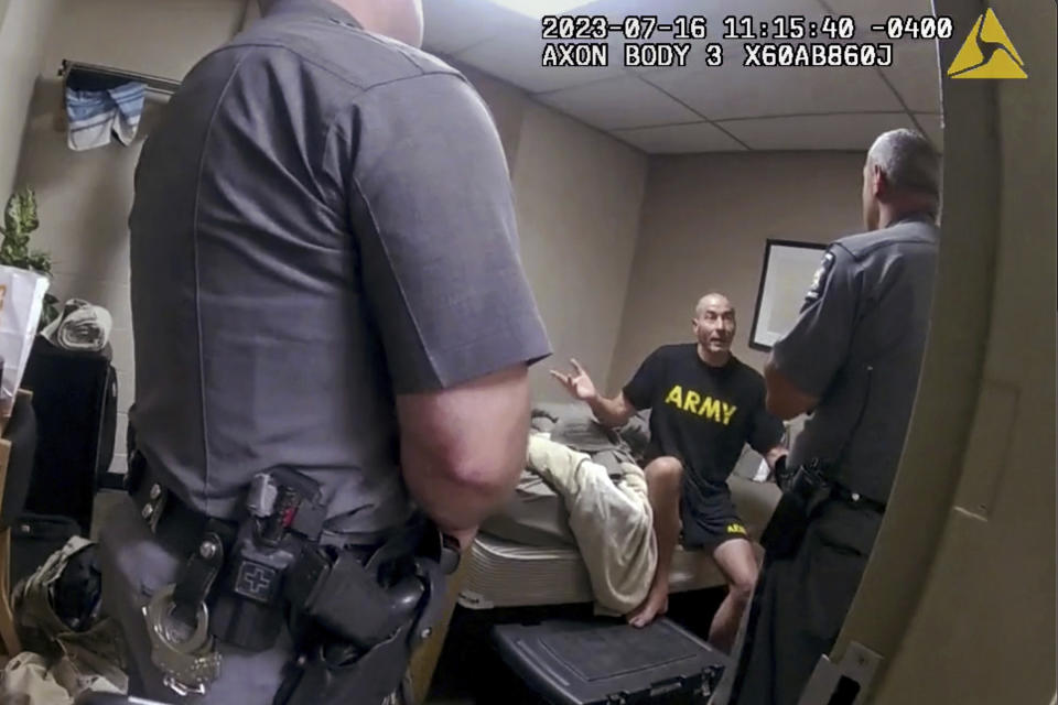 In this image taken from New York State Police body camera video that was obtained by WMTW-TV 8 in Portland, Maine, New York State Police interview Army reservist Robert Card, the man responsible for Maine's deadliest mass shooting, at Camp Smith in Cortlandt, N.Y., July 16, 2023. Army officials testified Thursday, March 7, 2024, before a special commission investigating the deadliest mass shooting in Maine history, which was committed by Card. (WMTW-TV 8/New York State Police via AP)