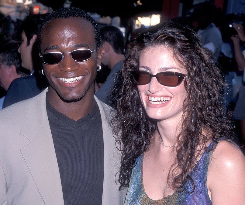 Close-up of Idina and Taye smiling