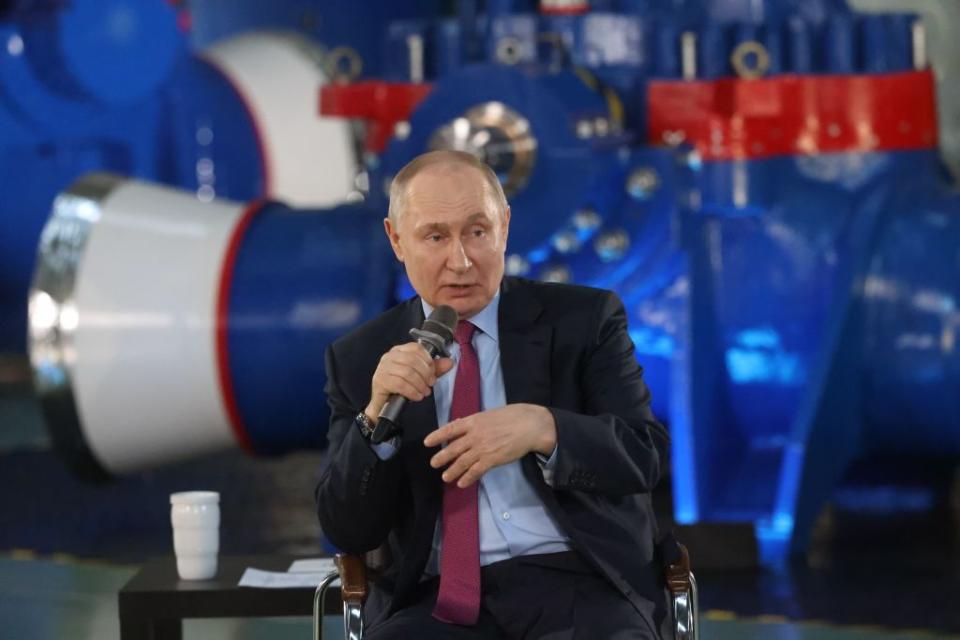 Russian President Vladimir Putin meets with gestures during his meeting with workers at the AO Konar plant in Chelyabinsk, Russia, on Feb. 16, 2024. (Contributor/Getty Images)