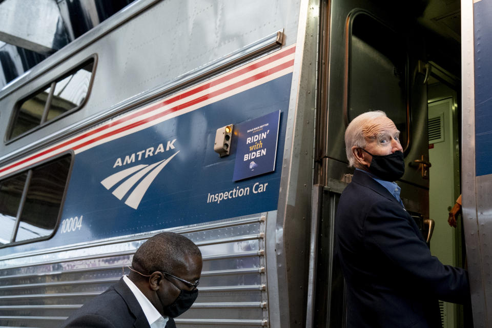 Democratic presidential candidate former Vice President Joe Biden boards his train at Amtrak's Pittsburgh Train Station, Wednesday, Sept. 30, 2020, in Pittsburgh. Biden is on a train tour through Ohio and Pennsylvania today. (AP Photo/Andrew Harnik)
