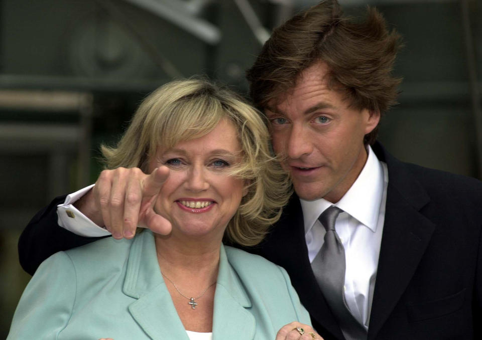 TV presenters Richard Madeley and Judy Finnigan outside the Channel 4 building in London after announcing a two-year deal with the channel. The TV hosts are quitting ITV's This Morning after 13 years to present a Channel 4 chat show.   * The pair said there had been no bidding war between channels, but they simply wanted to try something different. They are due to move to Channel 4 in the autumn when their current contract with Granada runs out. 