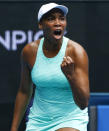 United States' Venus Williams celebrates after winning a point against Belgium's Kirsten Flipkens during their first round match at the Australian Open tennis championship in Melbourne, Australia, Monday, Feb. 8, 2021.(AP Photo/Rick Rycroft)