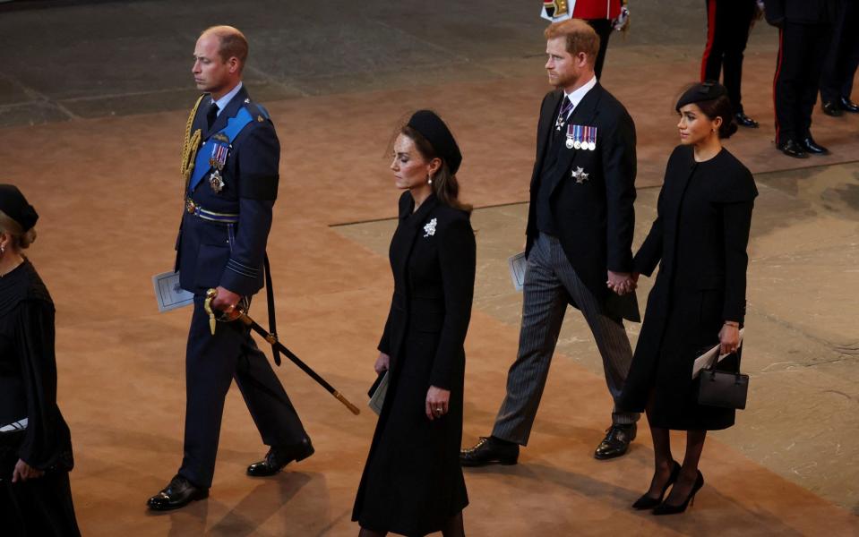 Prince William, Prince of Wales, Catherine, Princess of Wales, Prince Harry, Duke of Sussex and Meghan, Duchess of Sussex walked as procession on Wednesday - Phil Noble/WPA Pool/Getty Images