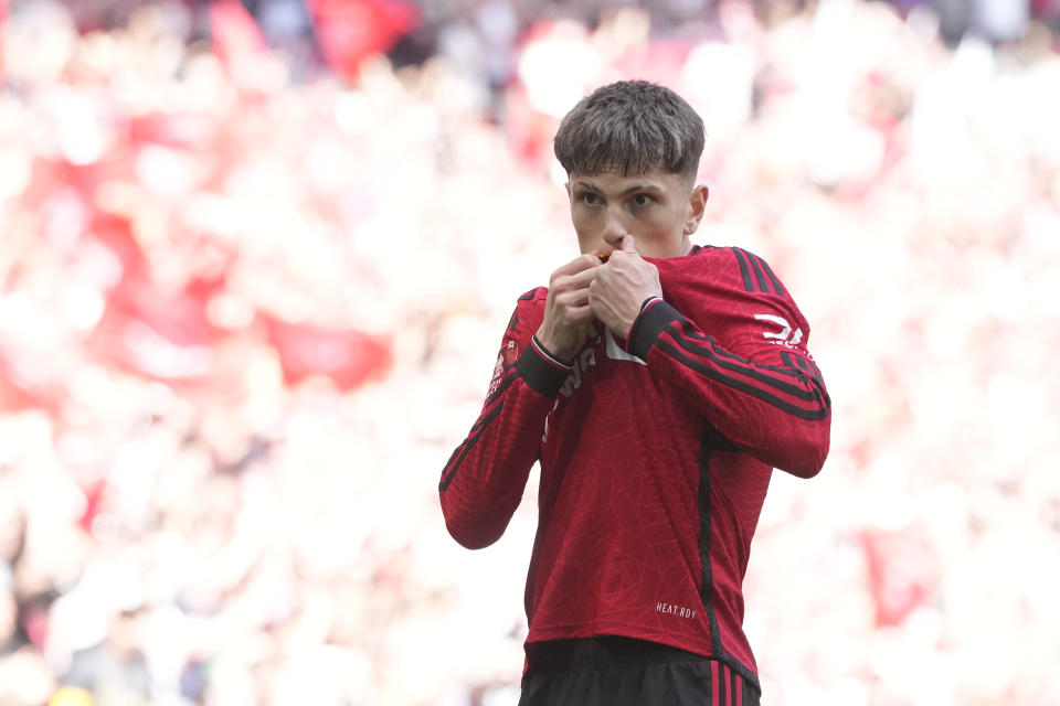 Manchester United's Alejandro Garnacho celebrates after scoring his side's opening goal during the English FA Cup final soccer match between Manchester City and Manchester United at Wembley Stadium in London, Saturday, May 25, 2024. (AP Photo/Kin Cheung)