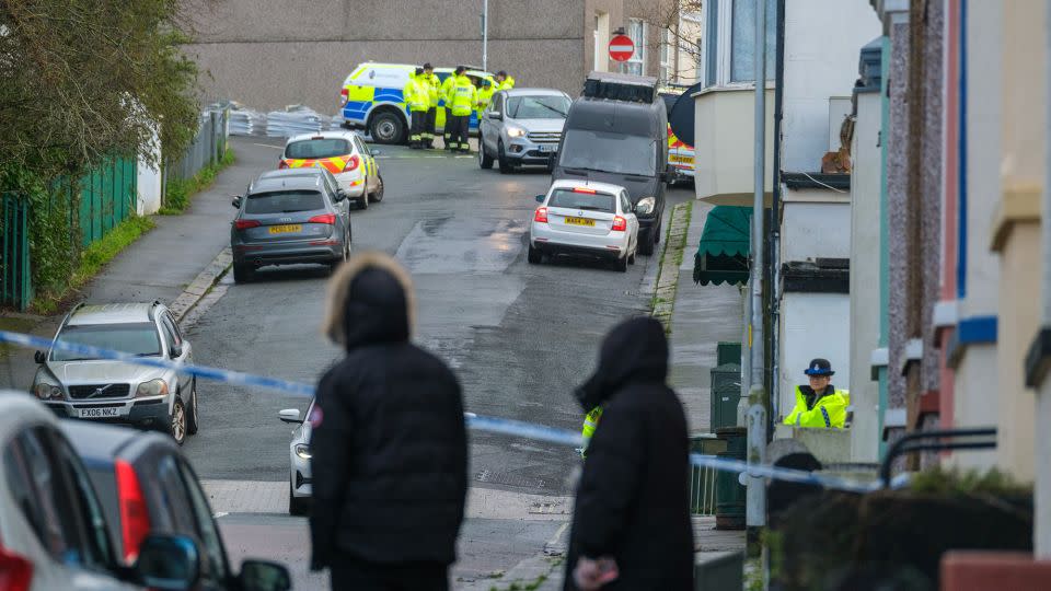 Members of HM Coastguard Search and Rescue gather after homes were evacuated when a suspected WWII explosive device was discovered. - Matt Keeble/PA Images/Getty Images