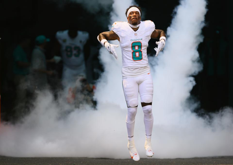 Sep 8, 2024; Miami Gardens, Florida, USA; Miami Dolphins safety Jevon Holland (8) runs onto the field before the game against the Jacksonville Jaguars at Hard Rock Stadium. Mandatory Credit: Sam Navarro-Imagn Images