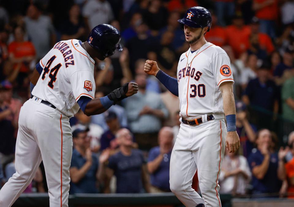 Outfielders Yordan Alvarez, left, and Kyle Tucker give the Astros a devastating 1-2 punch in their lineup.