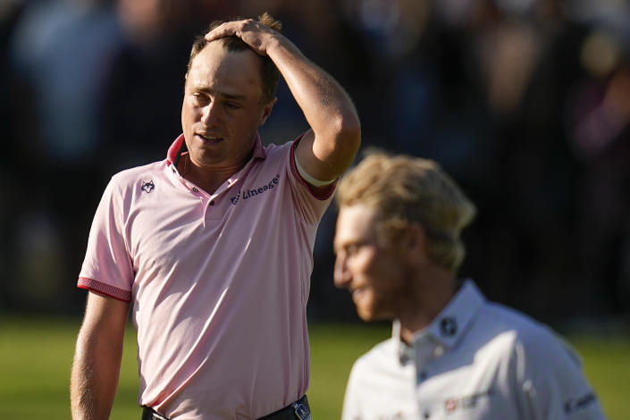Justin Thomas reacts after winning the PGA Championship golf tournament in a playoff against Will Zalatoris at Southern Hills Country Club, Sunday, May 22, 2022, in Tulsa, Okla. (AP Photo/Sue Ogrocki)