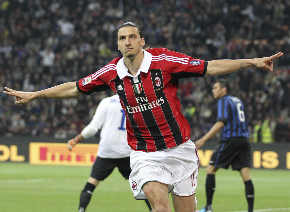 FILE - In this Sunday, May 6, 2012 filer, AC Milan forward Zlatan Ibrahimovic, of Sweden, celebrates after scoring during the Serie A soccer match between Inter Milan and AC MIlan at the San Siro stadium in Milan, Italy. Ibrahimovic will join AC Milan, the Milanese club announced Friday, Dec. 27, 2019 on its official twitter page. (AP Photo/Antonio Calanni, File)