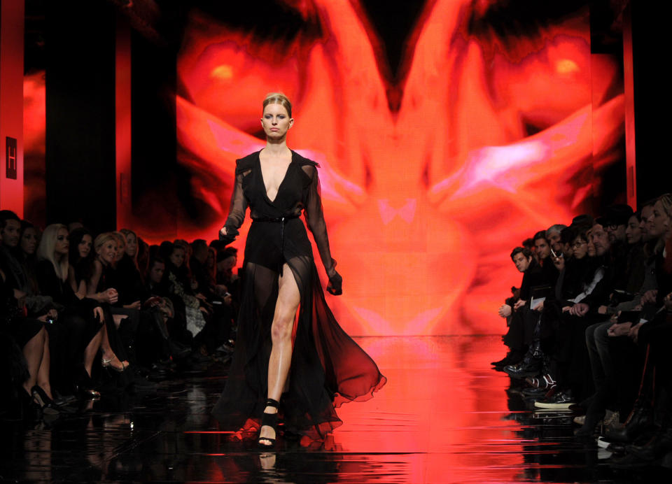 Model Karolina Kurkova walks the runway at the Donna Karan New York Fall 2014 collection during Fashion Week, Monday, Feb. 10, 2014, at 23 Wall Street in New York. (AP Photo/Diane Bondareff)