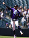 Colorado Rockies shortstop Ezequiel Tovar throws to first base to put out Tampa Bay Rays' Harold Ramírez in the first inning of a baseball game Sunday, April 7, 2024, in Denver. (AP Photo/David Zalubowski)