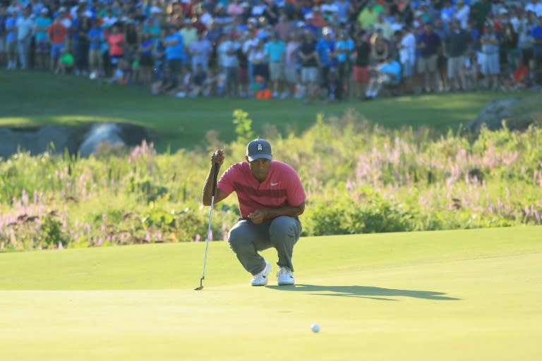 Tiger Woods was confident after a bogey-free 66 to share 21st on 138 at the Dell Technologies Championship